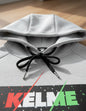 Canguro deportivo con capucha logo KELME