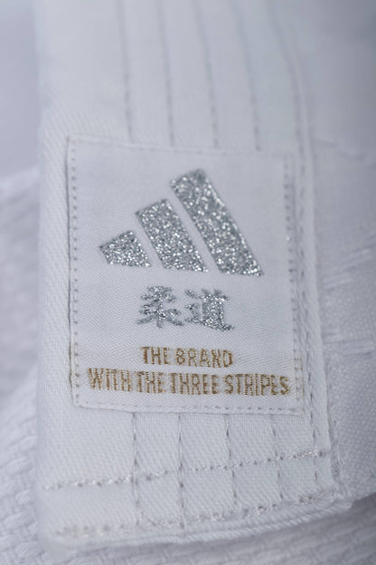 Uniforme Judo Adidas Contest J650P Blanco/Plateado Premium para Competicion Nacional y Entrenamiento Profesional